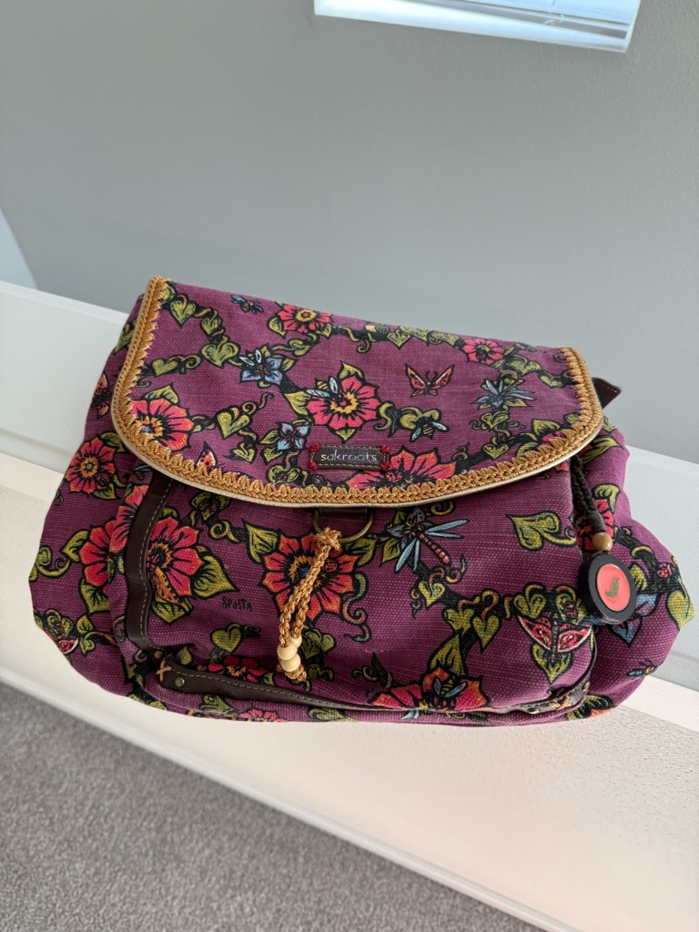 REHAB NEEDED- Sakroots Plum Floral Print backpack